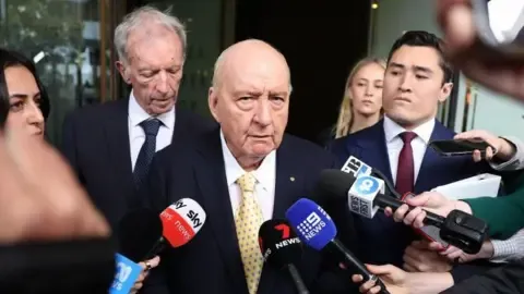 Indecent Assault Charges Against Top Down Under Broadcaster Lessened